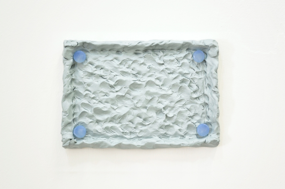 35 - Agnes Calf, Rotation (Earplugs-Blue), 2013, Clay, Acrylic Paint, Varnish, Silicone Earplugs, 17 x 24 x 2.5cm copy